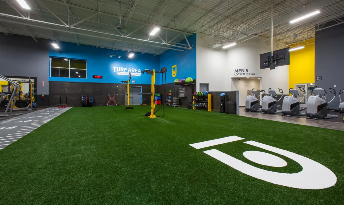 interior shot of a Chuze Fitness turf field