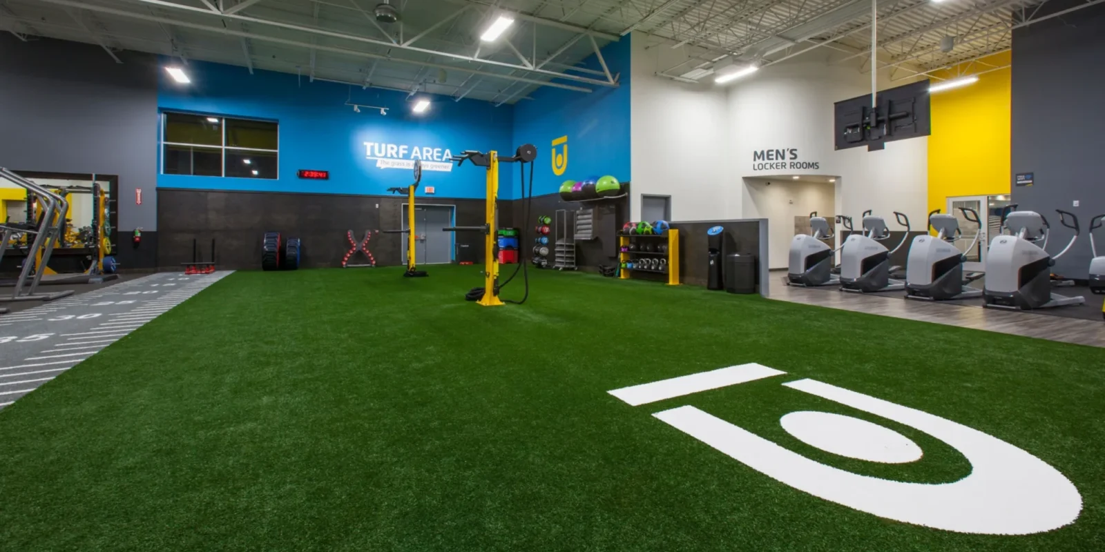 interior shot of a Chuze Fitness turf field