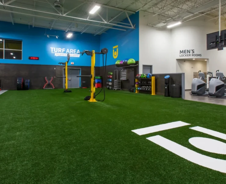 interior shot of a Chuze Fitness turf field