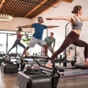 People in a reformer class