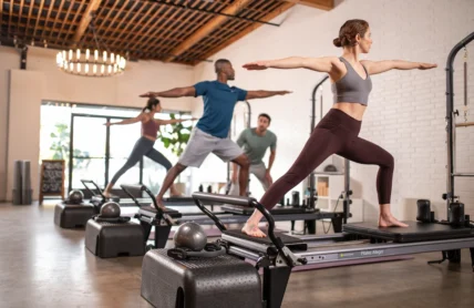 People in a reformer class