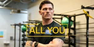 A U.S. Army "All You" promo photo featuring a a man with tattoos.