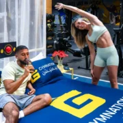 a man and woman staying at GymNation's concept hotel.