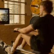 a man working out on a Hydrow at Soho house.