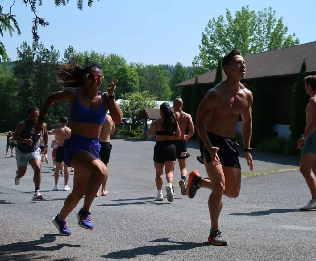 man and woman sprint outside
