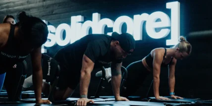 People working out in a Solidcore class.