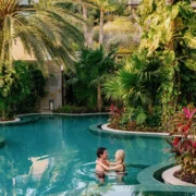 a couple in a pool at Zadún, a Ritz-Carlton Reserve