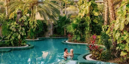 a couple in a pool at Zadún, a Ritz-Carlton Reserve
