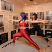 Women doing yoga in a sauna