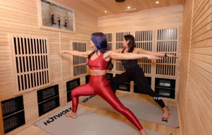 Women doing yoga in a sauna