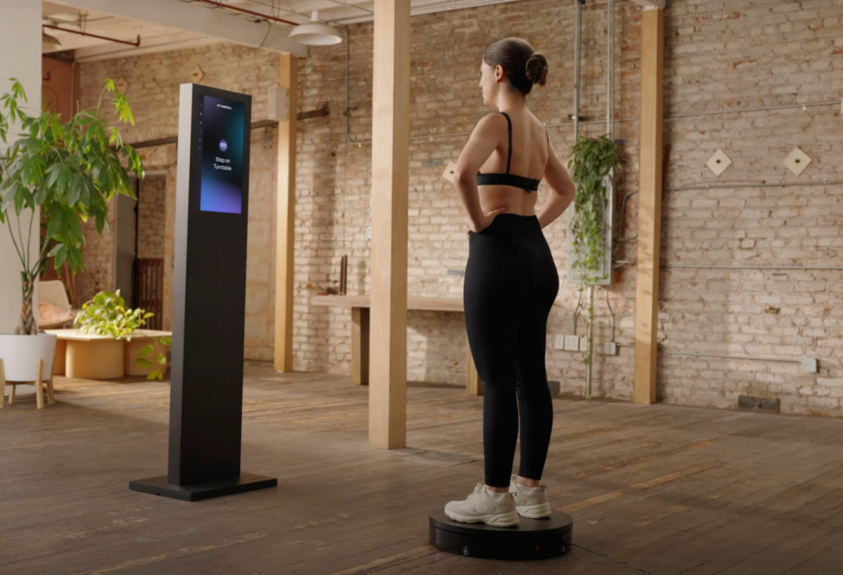 A woman getting scanned by Fit:match.