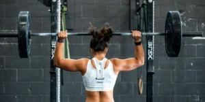 woman lifting a barbell