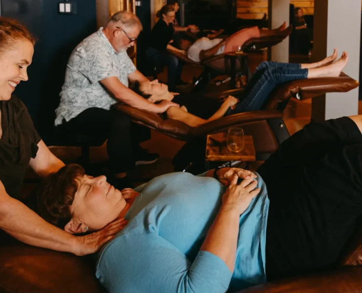 a woman receiving a massage at Relax and Unwind Social Spa