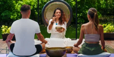 A couple participating in a sound healing session.
