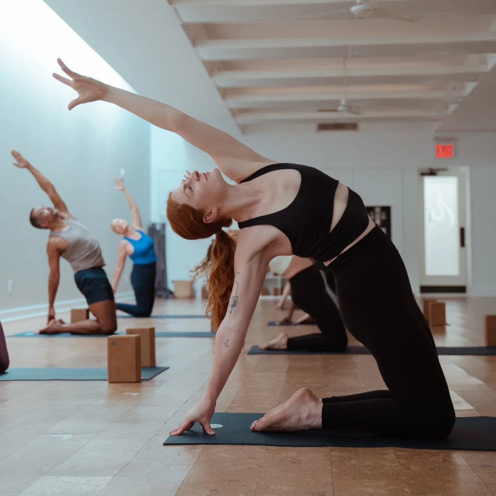 A woman doing yoga at Fyra Yoga.