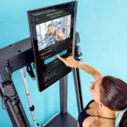a woman using an Echelon fitness system