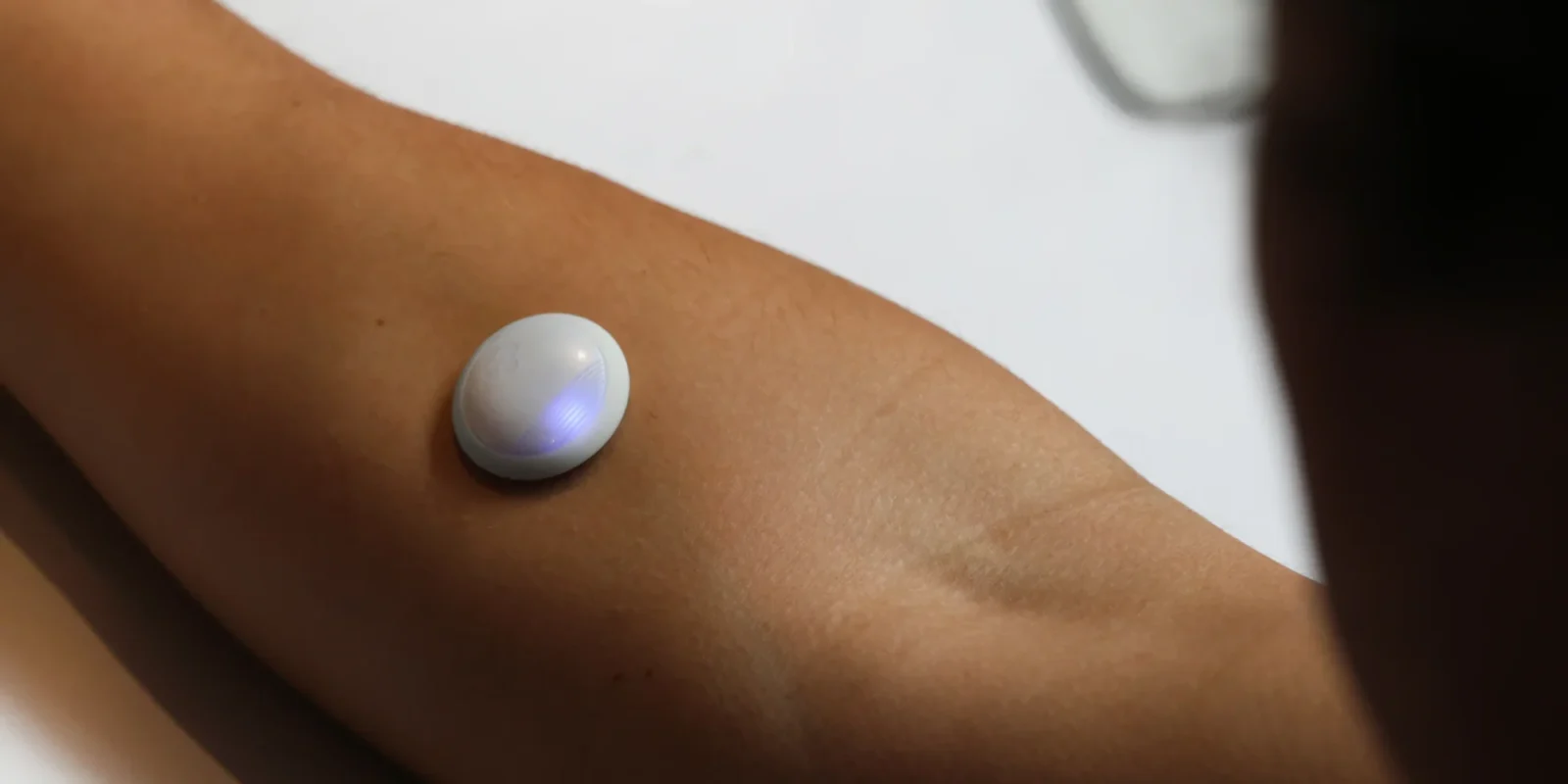 A woman wearing a Biolinq wearable.