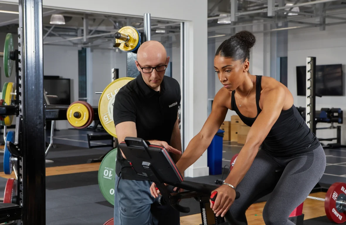 Trainer with client on Wattbike