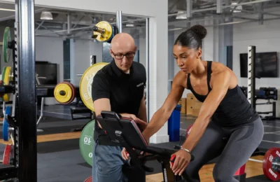 Trainer with client on Wattbike