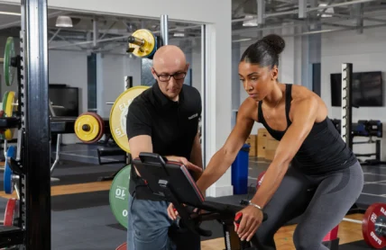 Trainer with client on Wattbike