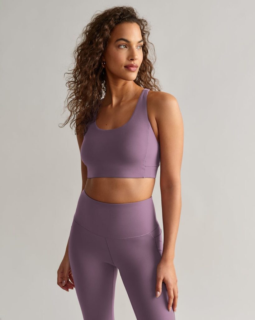 rhone activewear sports bra and leggings in lilac color