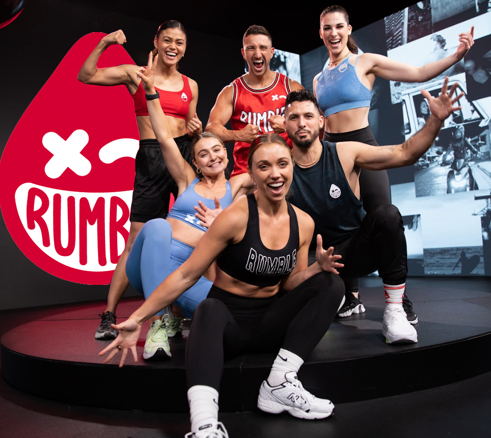 Rumble Boxing instructors pose for a photo