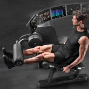 Man on leg extension machine