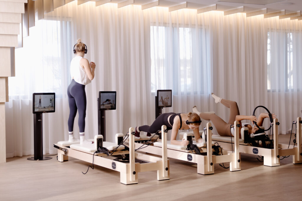 A wellness room stock with several reformers from Your Reformer.