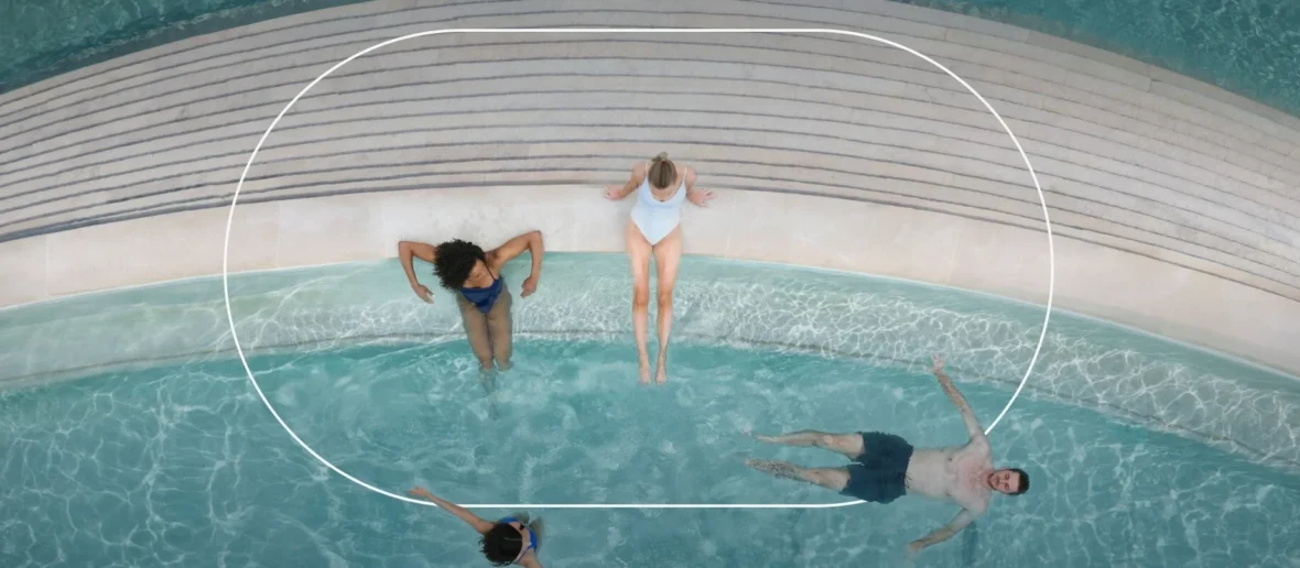 A group of people at Worldsprings in the water.