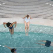 A group of people at Worldsprings in the water.