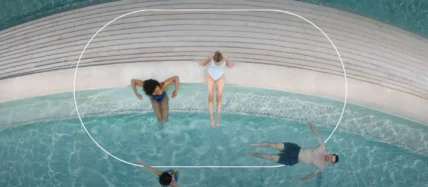 A group of people at Worldsprings in the water.