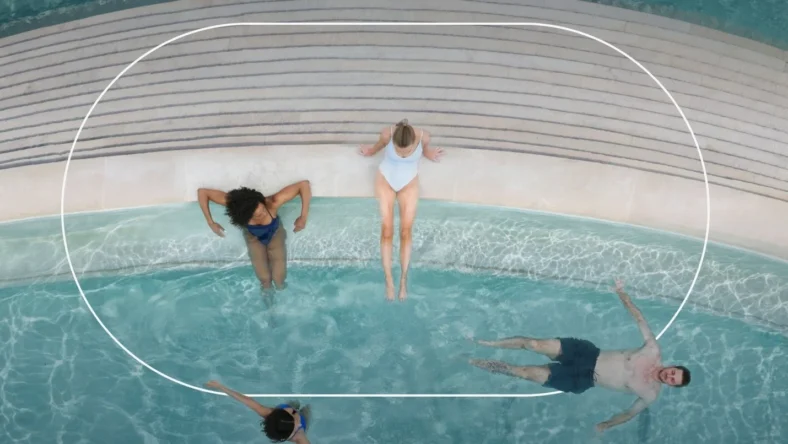 A group of people at Worldsprings in the water.