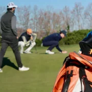 Golfers on the green.