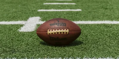 A football on a field.