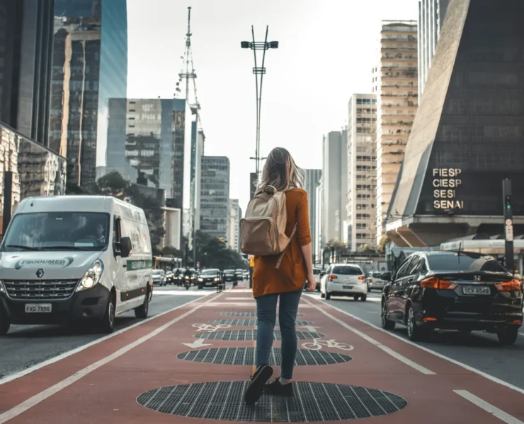 A woman traveler wearing a backpack.