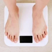 a woman on a scale