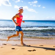 man runs on the beach