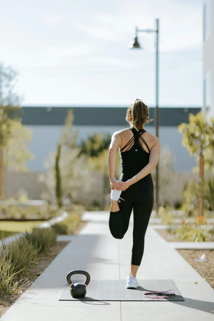 A woman stretching before a workout.