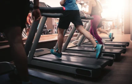 man runs on a treadmill