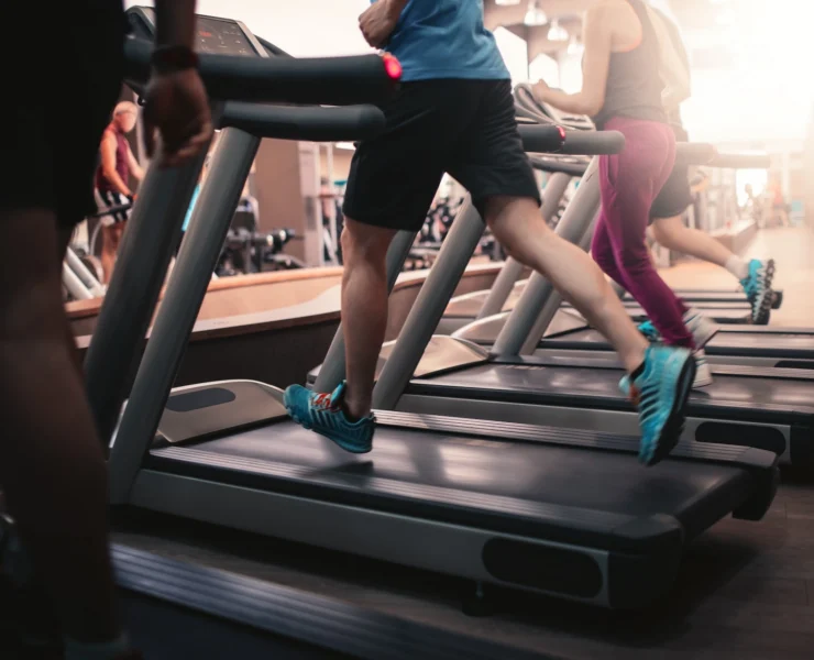 man runs on a treadmill