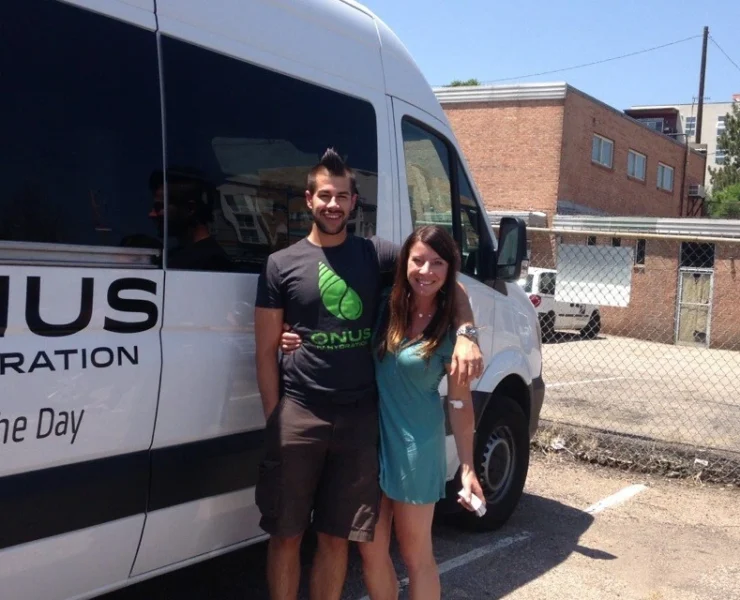Onus IV Therapy + Longevity people in front of van