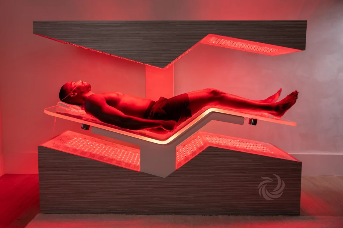 woman lies inside of an Ammortal Chamber
