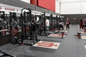 college students lift weights at the Indiana University rec center