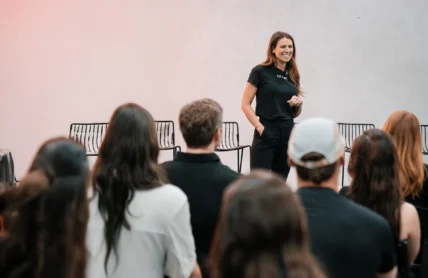Woman speaking to crowd