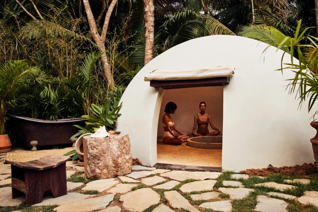 People sitting in a yurt at Four Seasons.