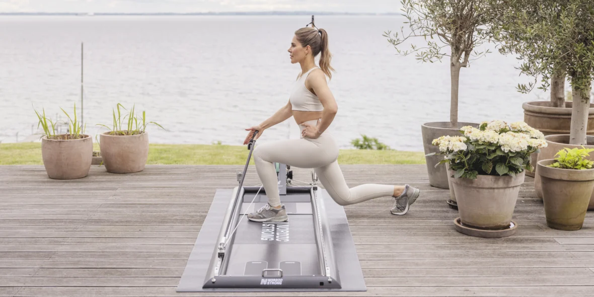 woman doing Nordic Strong cross-country skiing-inspired workout