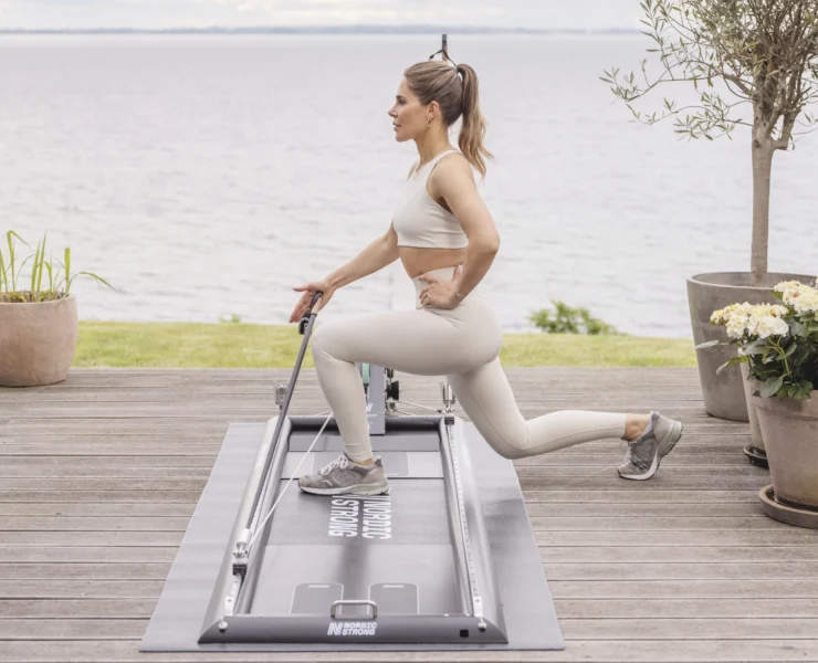 woman doing Nordic Strong cross-country skiing-inspired workout