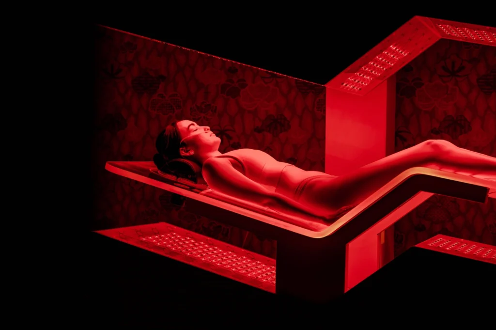 woman lies inside of an Ammortal Chamber
