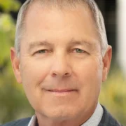 a headshot of Xpo CEO Mark King