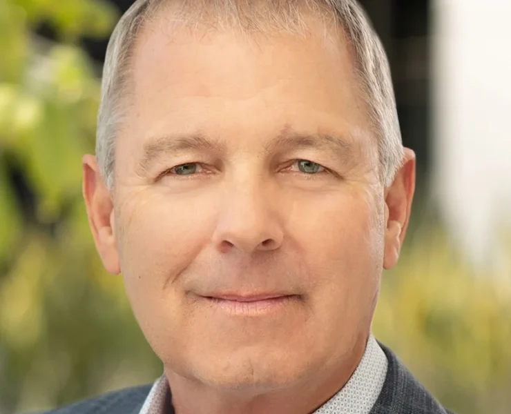 a headshot of Xpo CEO Mark King